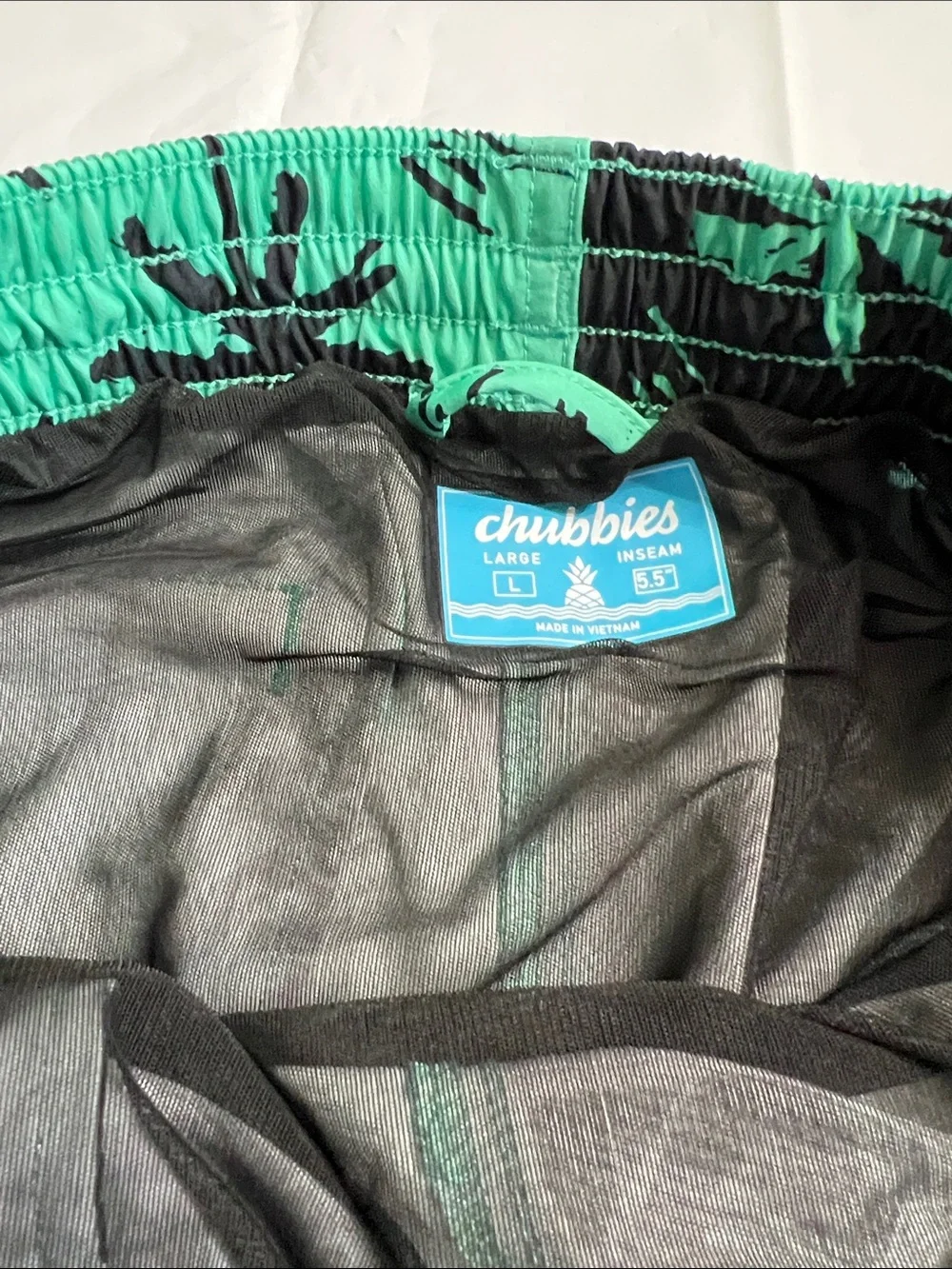 Chubbies Two-Tone Mint and Black Palm Swim Shorts